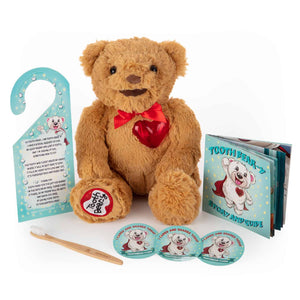 Tooth Bear-y Kit in Brown. Includes a Storybook, Sustainable Toothbrush, Caring and Sharing Stickers, a door hanger and the Brown Tooth Bear-y